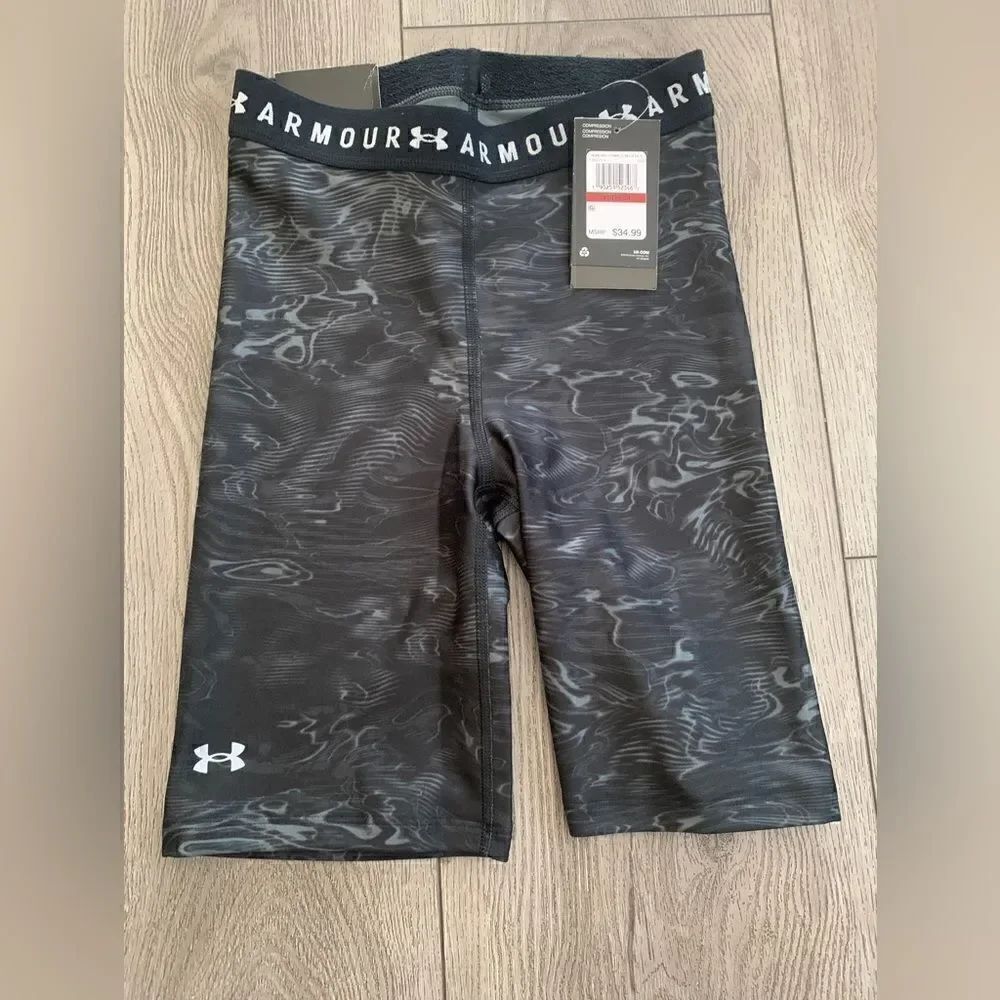 Under Armour woman’s size XS compression high rise bike shorts